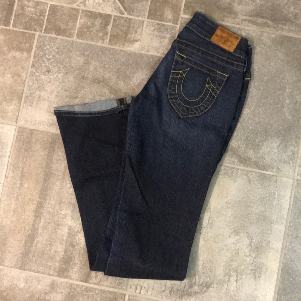 Women’s dark washed True Religion denim